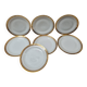 7 assiettes Limoges doré à l'or fin