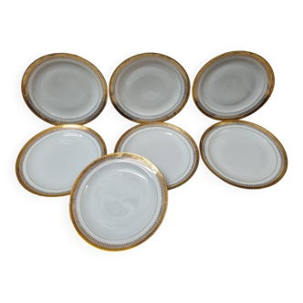 7 assiettes Limoges doré à l'or fin