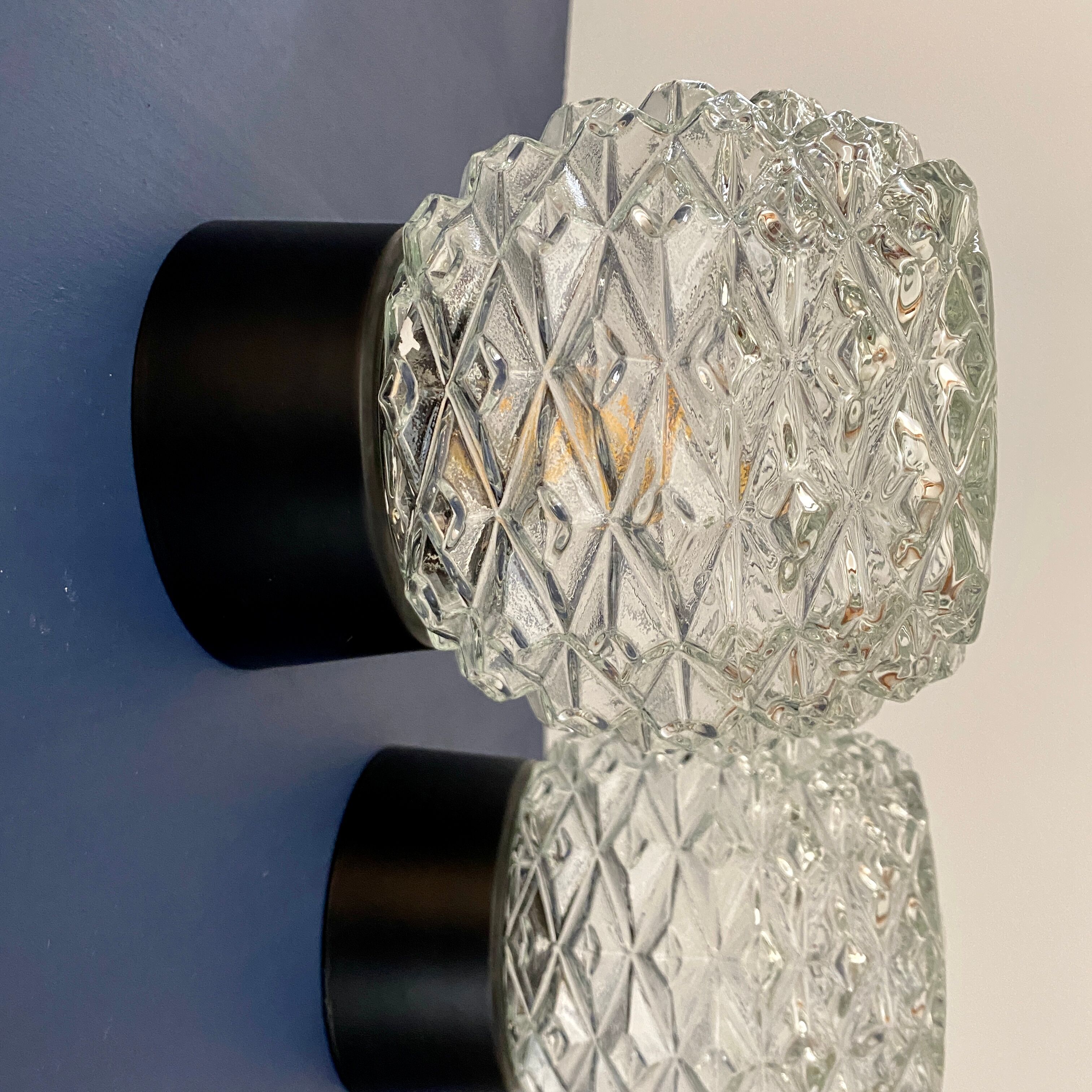 Pair of vintage wall lamps in molded glass and thermoplastic