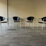 Set of four Italian black leather chairs, 1970