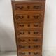 Regency-style chest of drawers in solid cherry wood, 20th century.
