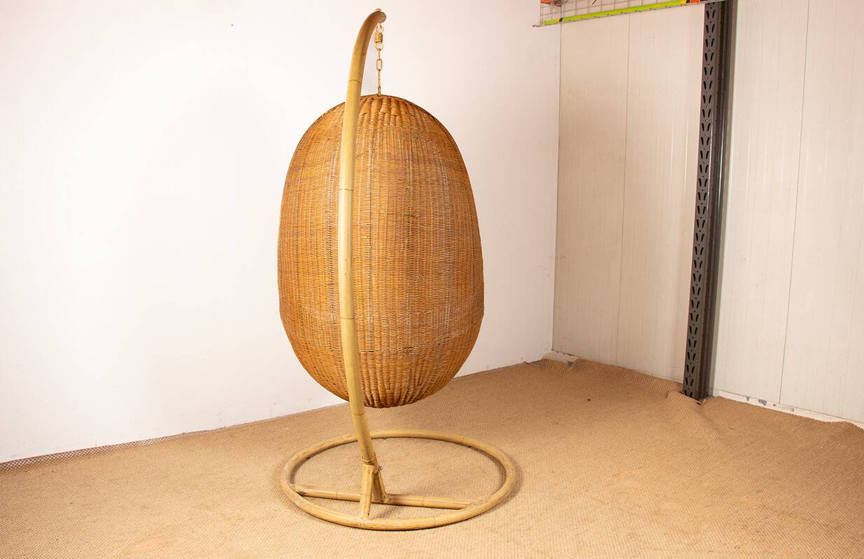 Danish armchair in woven rattan, with its metal stand, Nana Ditzel.