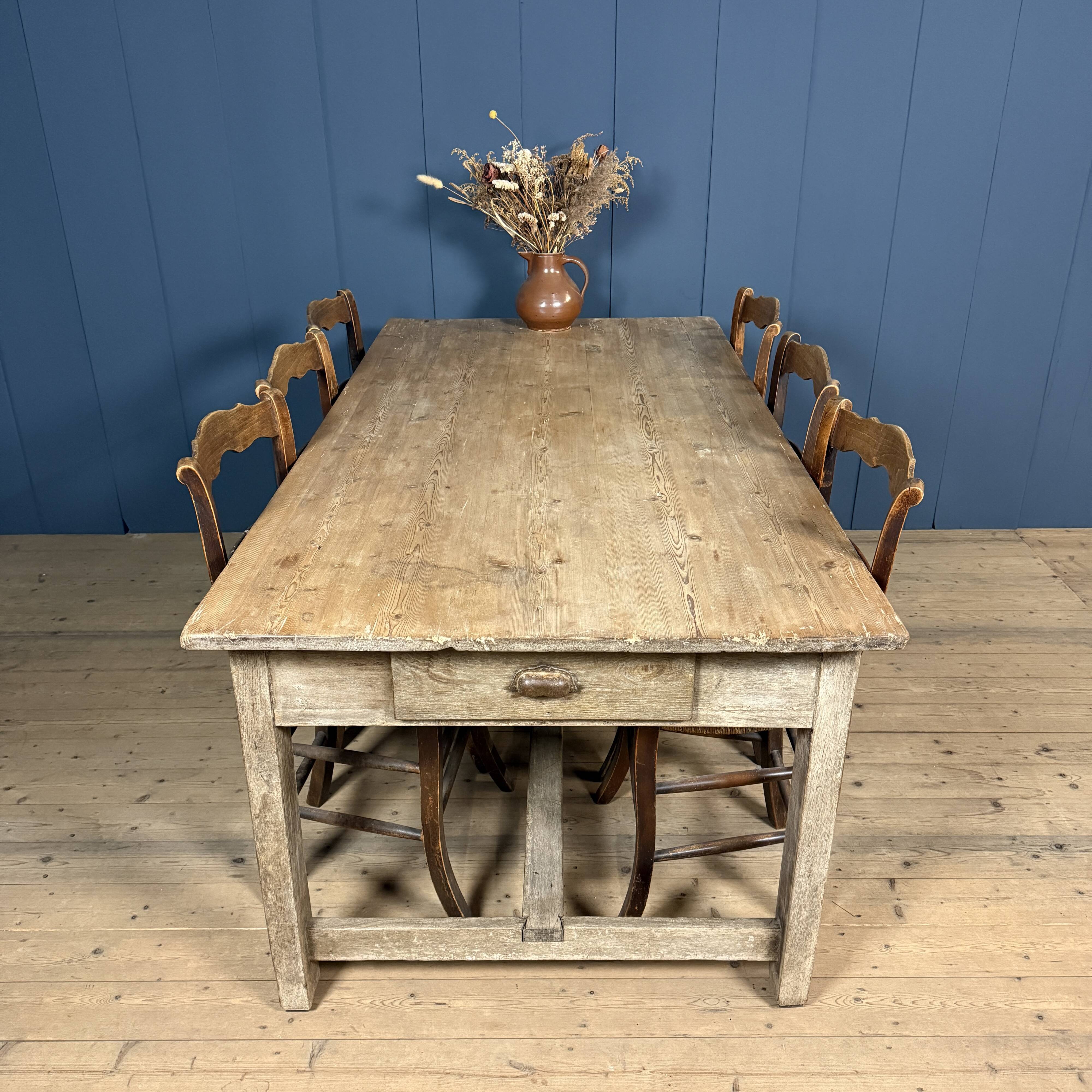 French farmhouse dining table with pine top and oak base