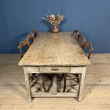 French farmhouse dining table with pine top and oak base
