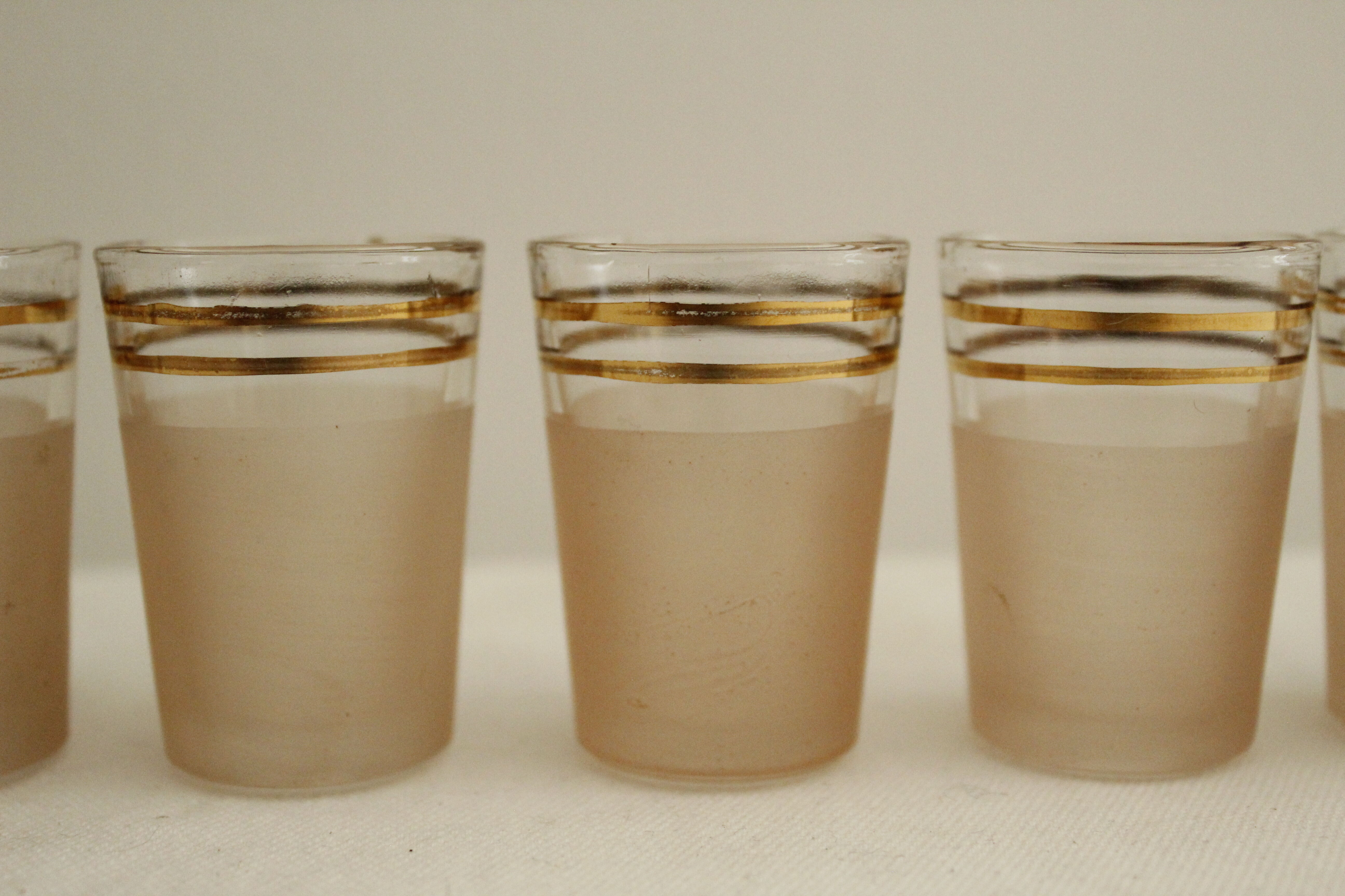 7 pink and gold vintage glass liquor glasses