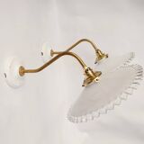 Swan neck sconces in serrated opaline