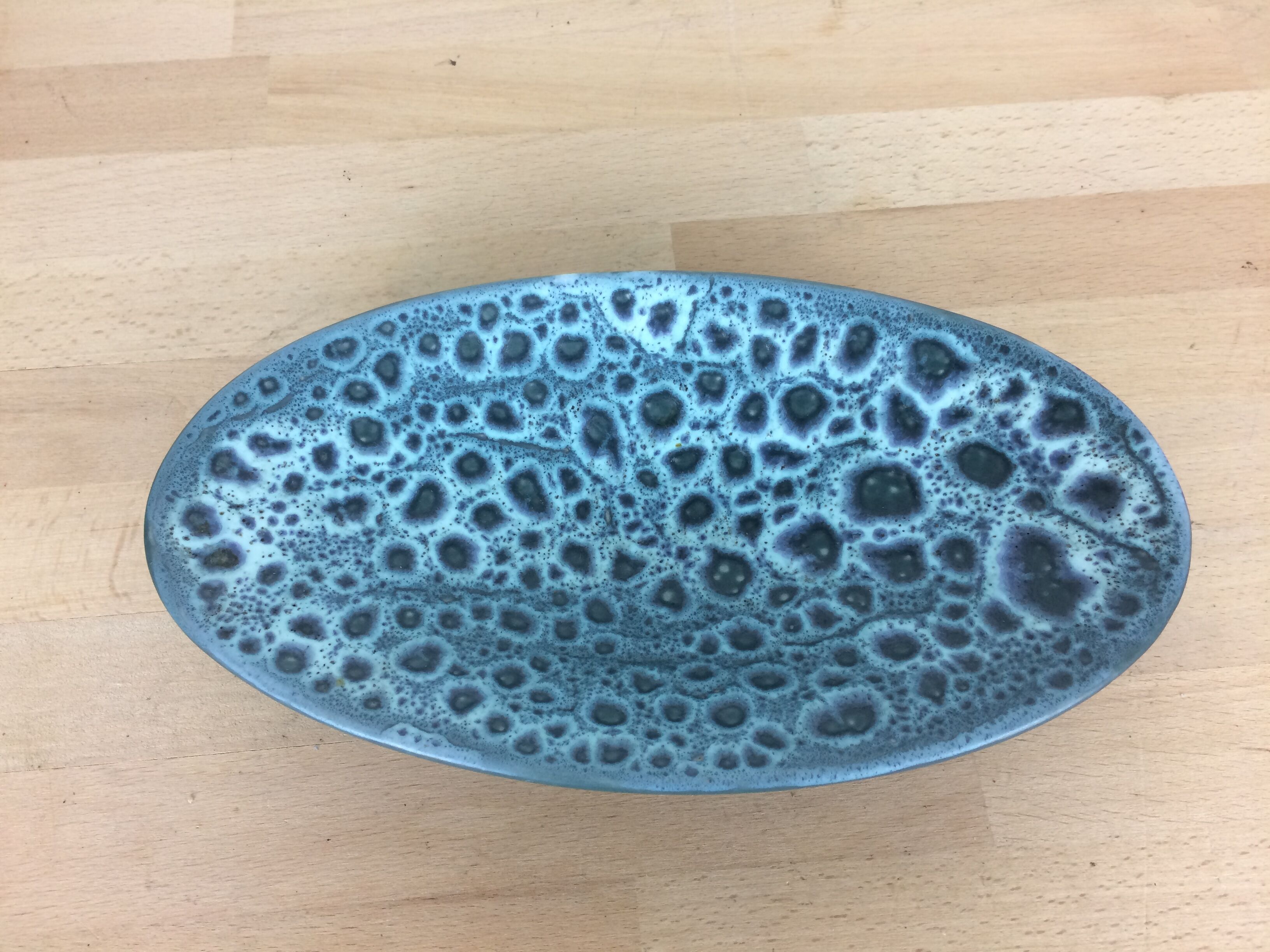 Empty vintage blue ceramic pocket