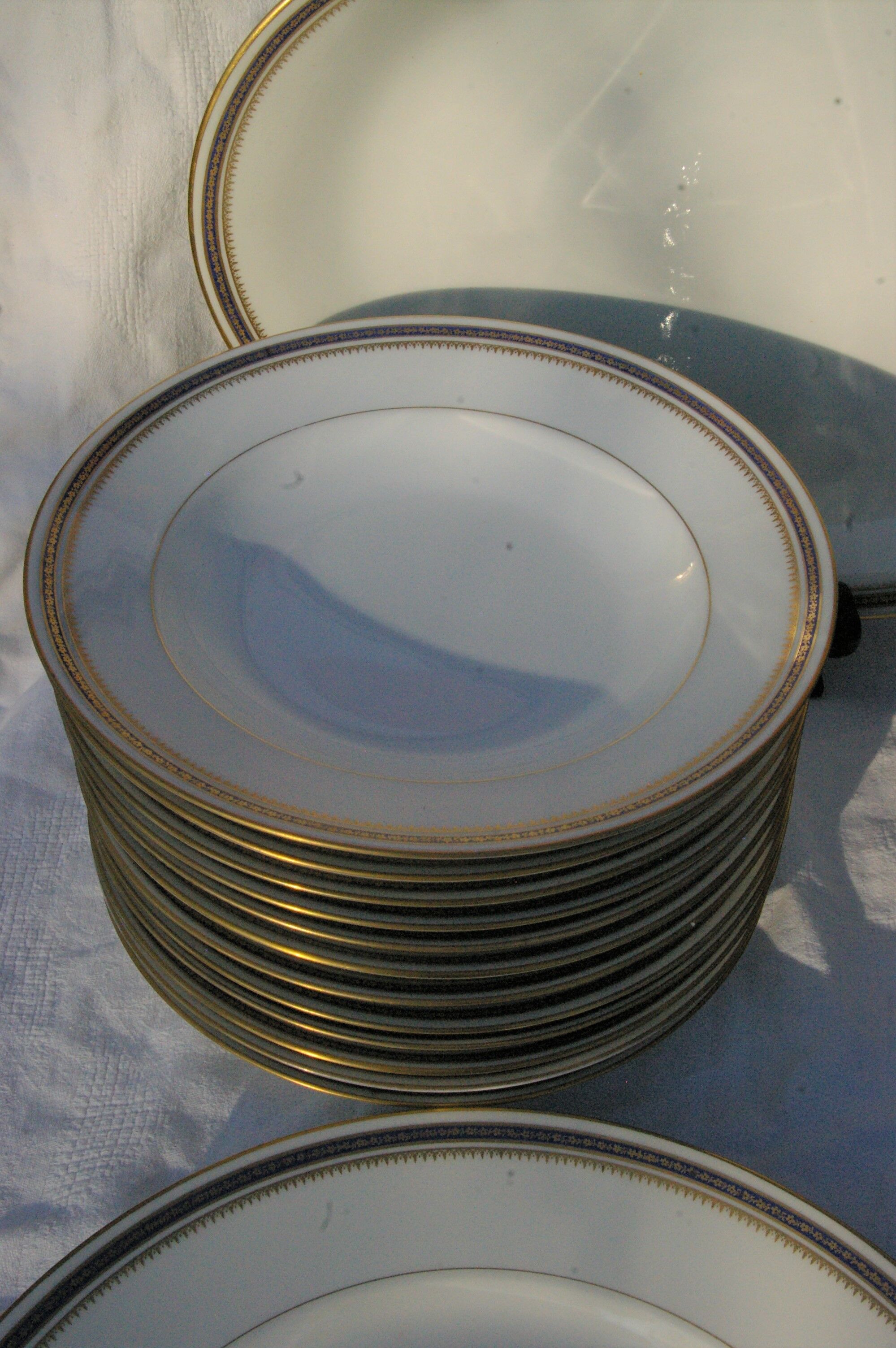 Table service 58 pieces in limoges porcelain uc - blue and gold border