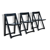 Set of three black folding chairs circa 1980