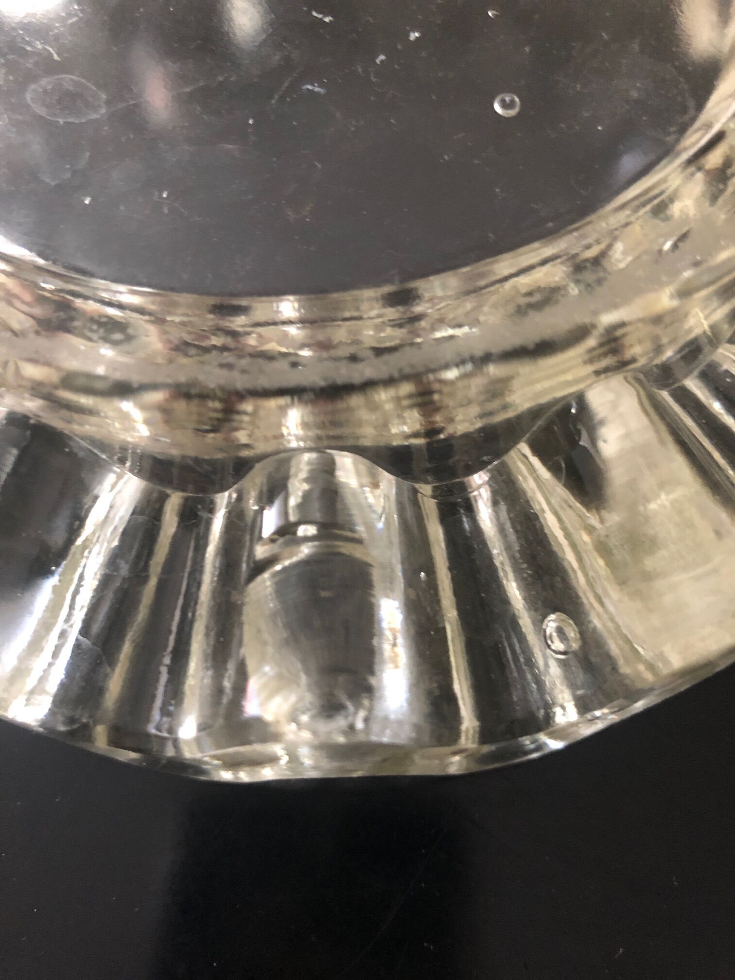 Curved glass ashtray