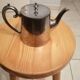 silver-plated teapot
