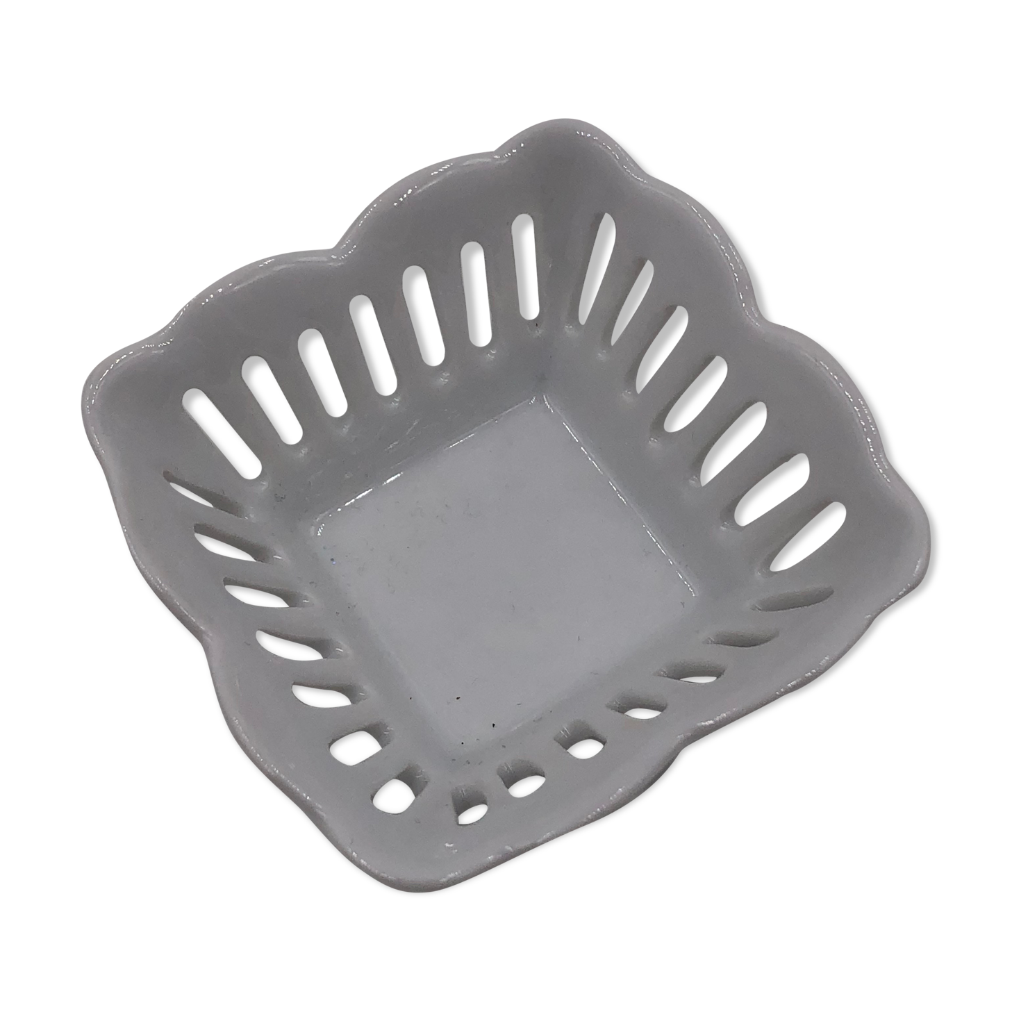 Empty vintage openwork porcelain pocket