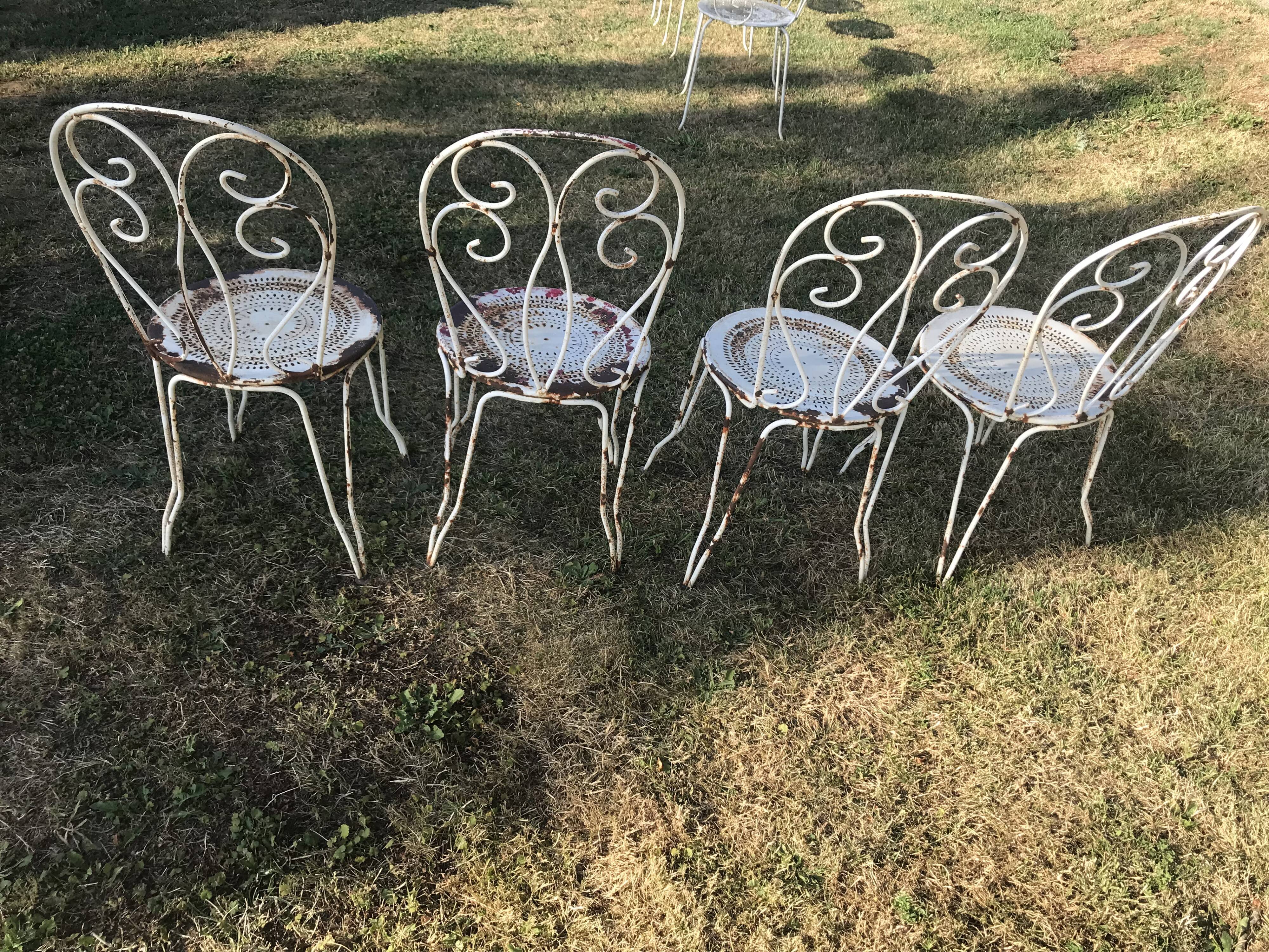 4 wrought iron garden chairs