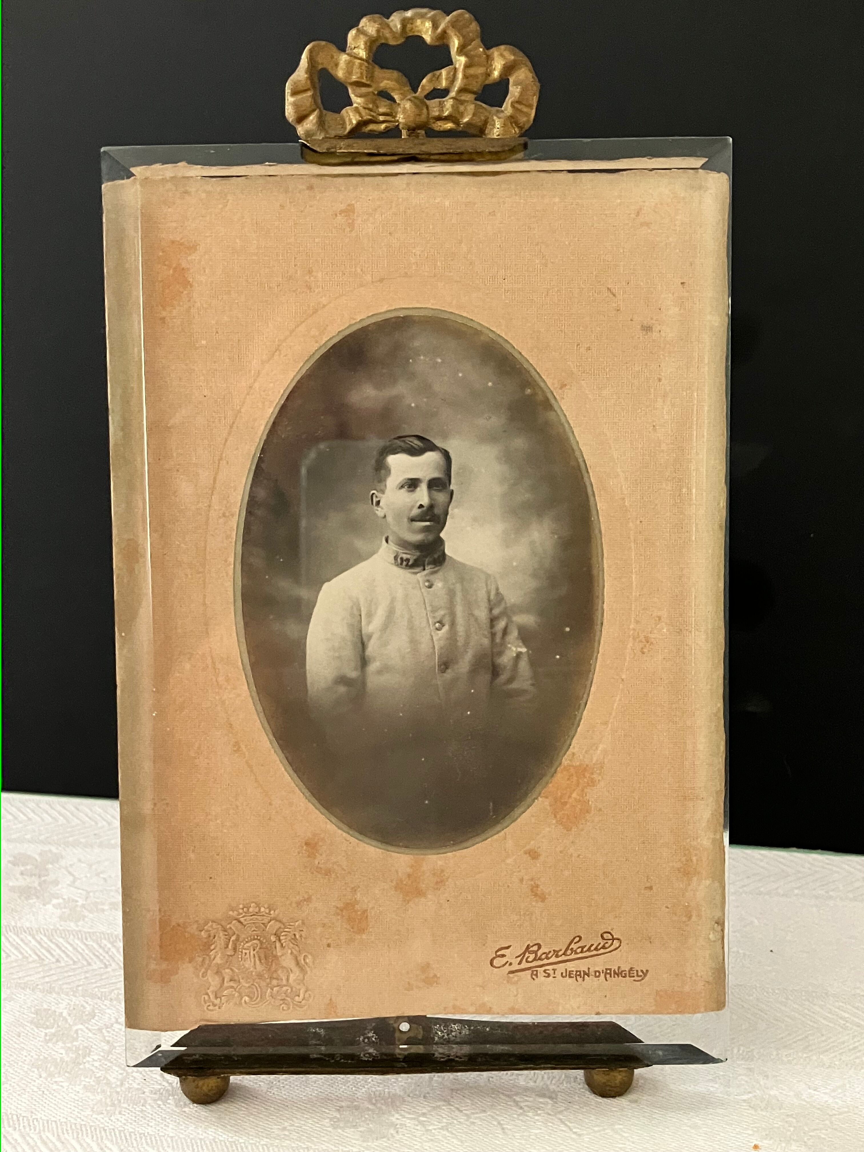 Brass frame, bevelled glass