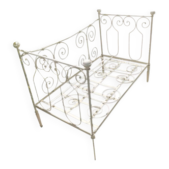 White wrought iron bed