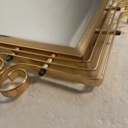 Vintage faceted mirror in an aluminium frame