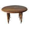 Old round table in solid cherry wood, expandable and folding