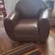 Brown leather club chair