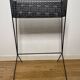 1950s black perforated metal planter in the style of Mathieu MATEGOT