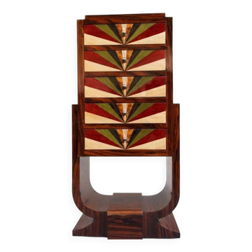 An Art Deco chest of drawers with five beech and rosewood drawers.