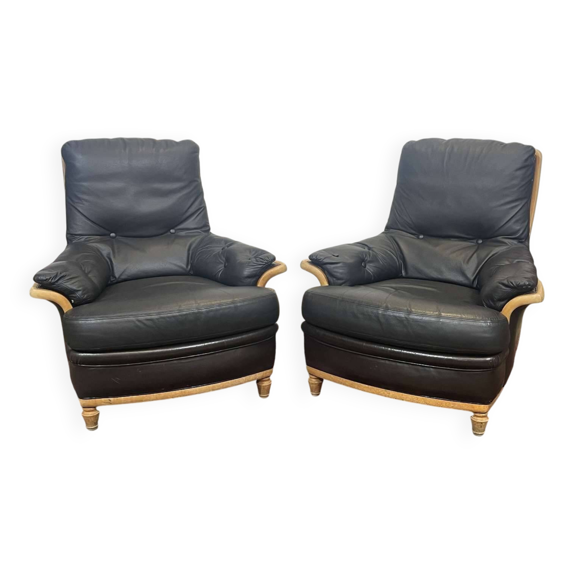 Pair of leather and beech armchairs from the 1970s.