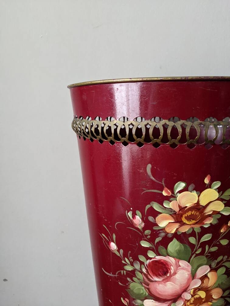 Antique metal umbrella stand with hand-painted floral decor, bohemian countryside