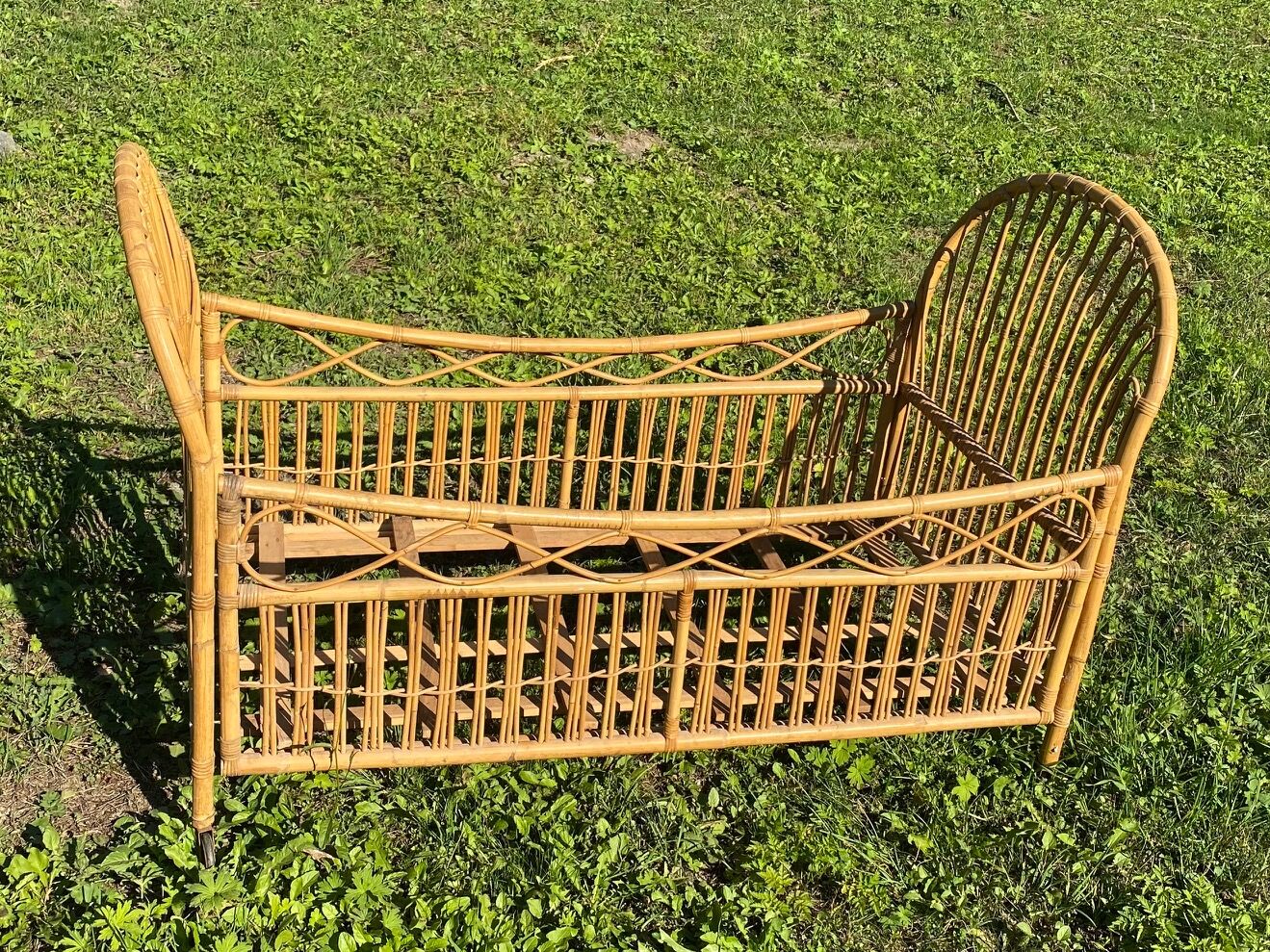 Children's bed in vintage rattan