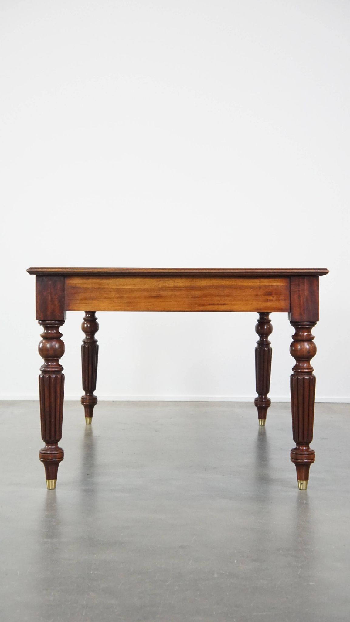 Large writing desk with green leather top, elegant legs and 3 English style drawers