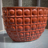 Modernist pottery cache in emailed earthenware