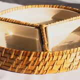 Compartment dish for appetizers, made of porcelain with a wicker support.