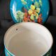 Antique porcelain candy box with floral motifs