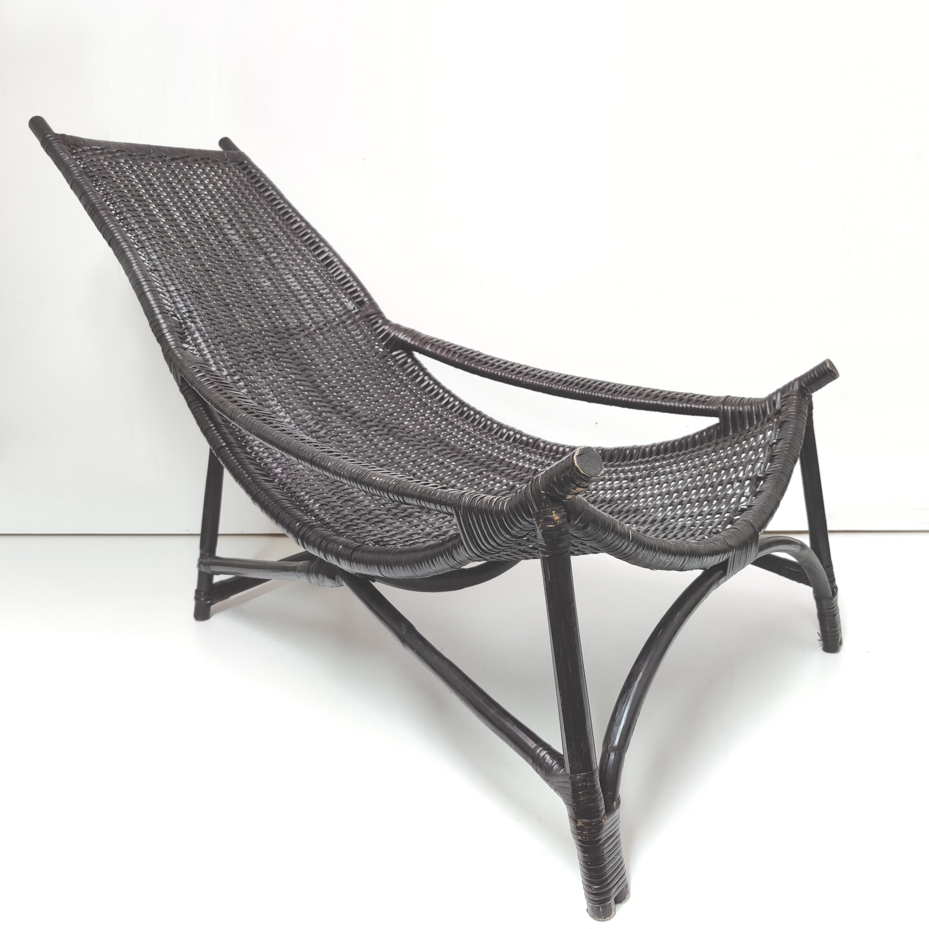 Vintage black rattan deck chair