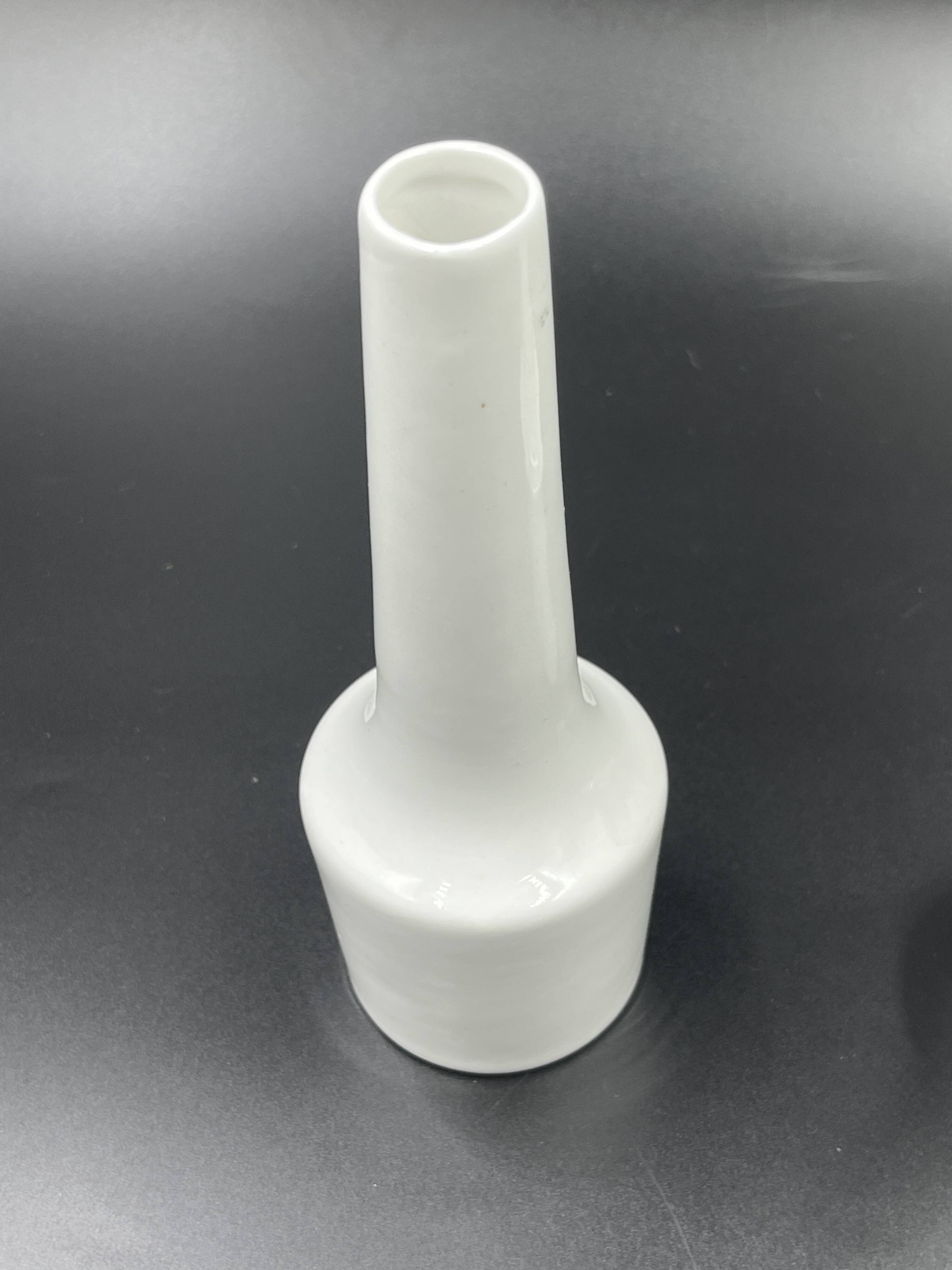Pair of vintage white ceramic bud vases