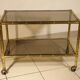 Serving trolley, table on wheels in "bamboo" brass