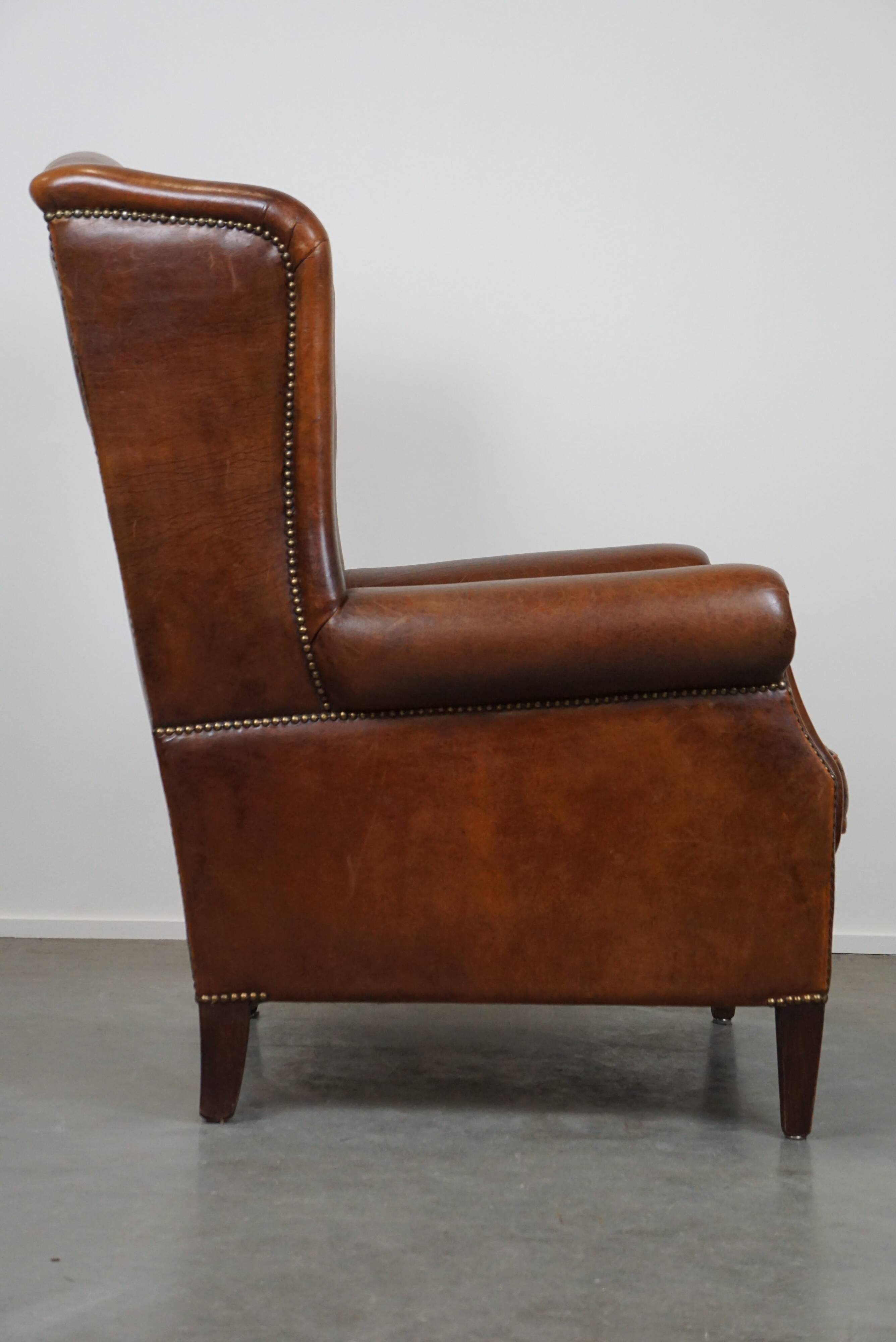 especially comfortable wingback chair made of sheepskin leather, stunning colors