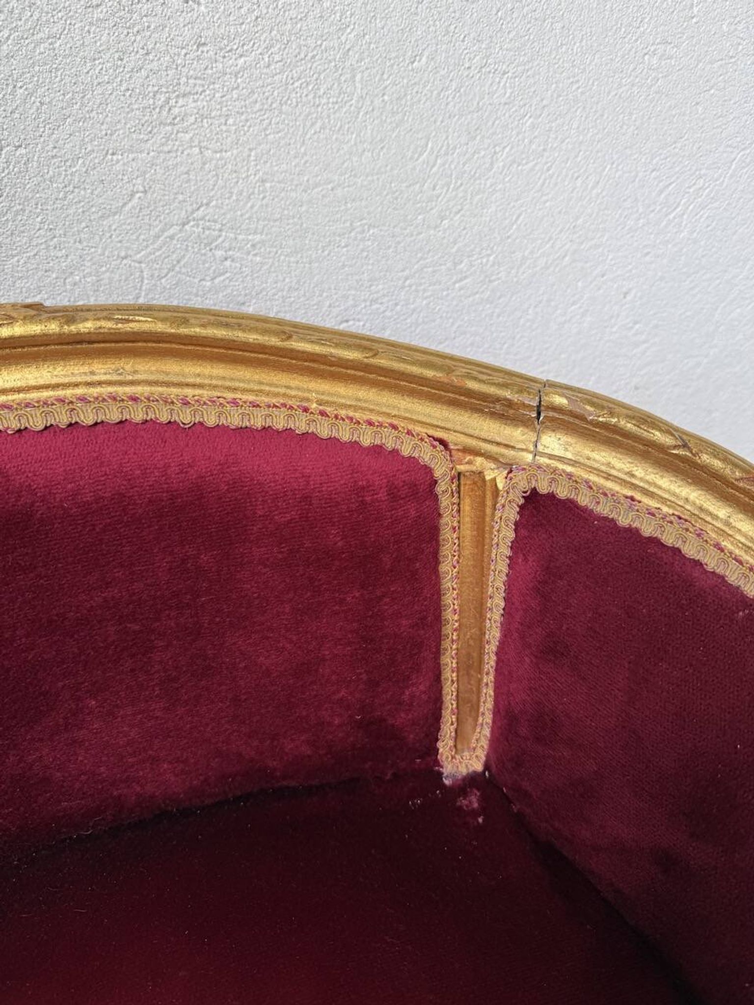 Louis XVI gilt wood and red velvet armchair