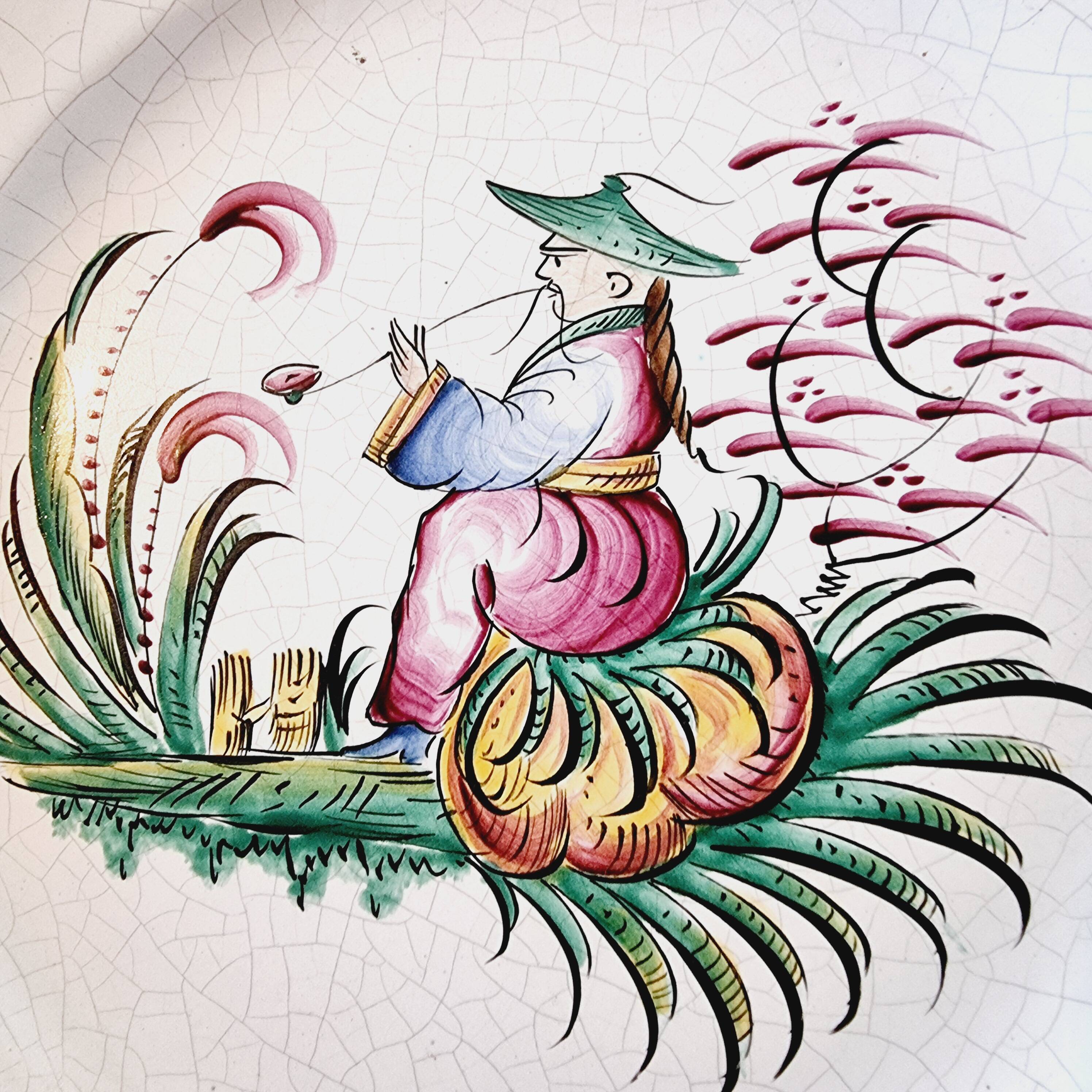 Antique ceramic or earthenware plate from the 19th century, Chinese style decoration