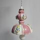 Suspension in antique slipware