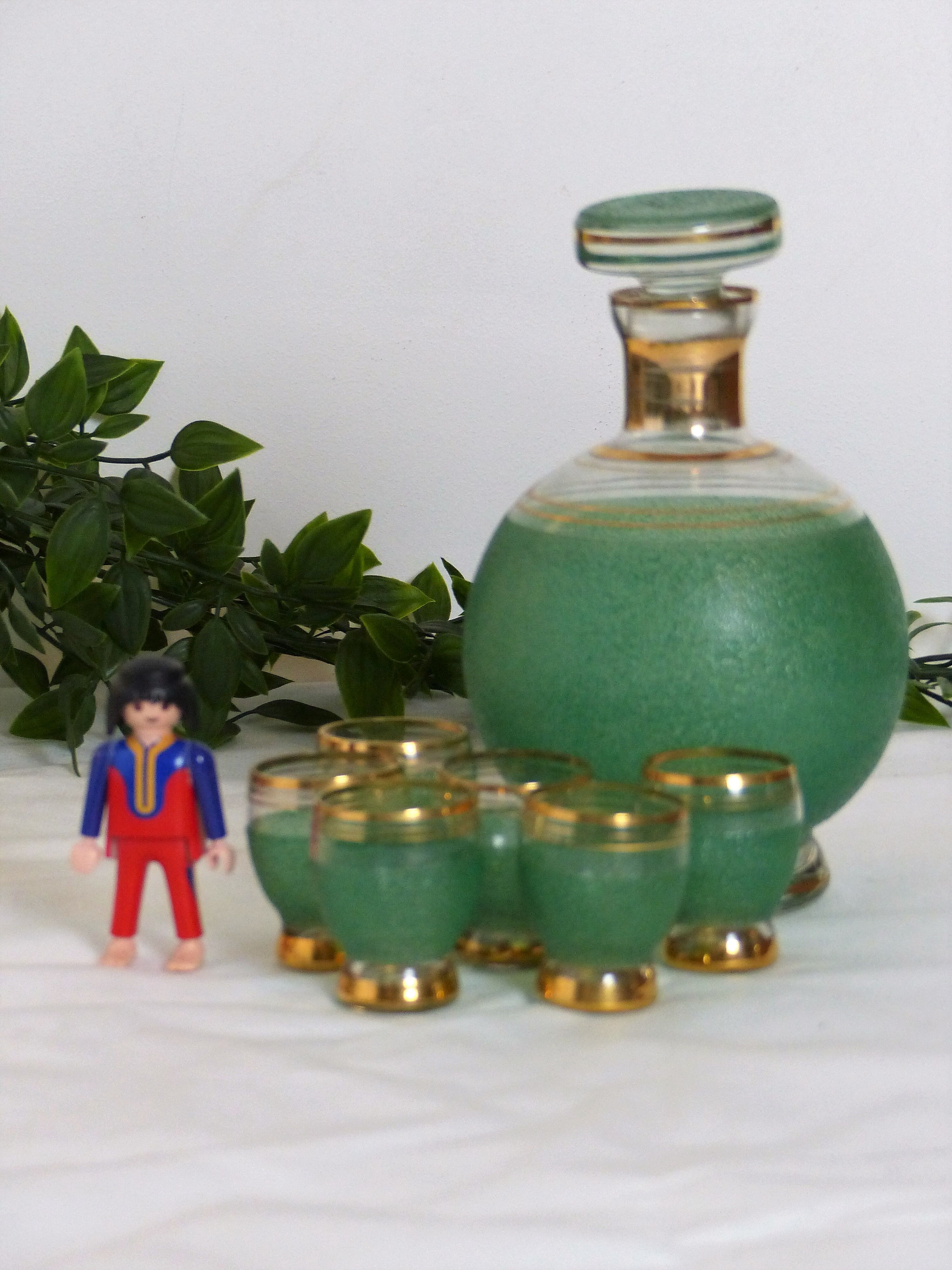 Green liqueur carafe and its 6 glasses