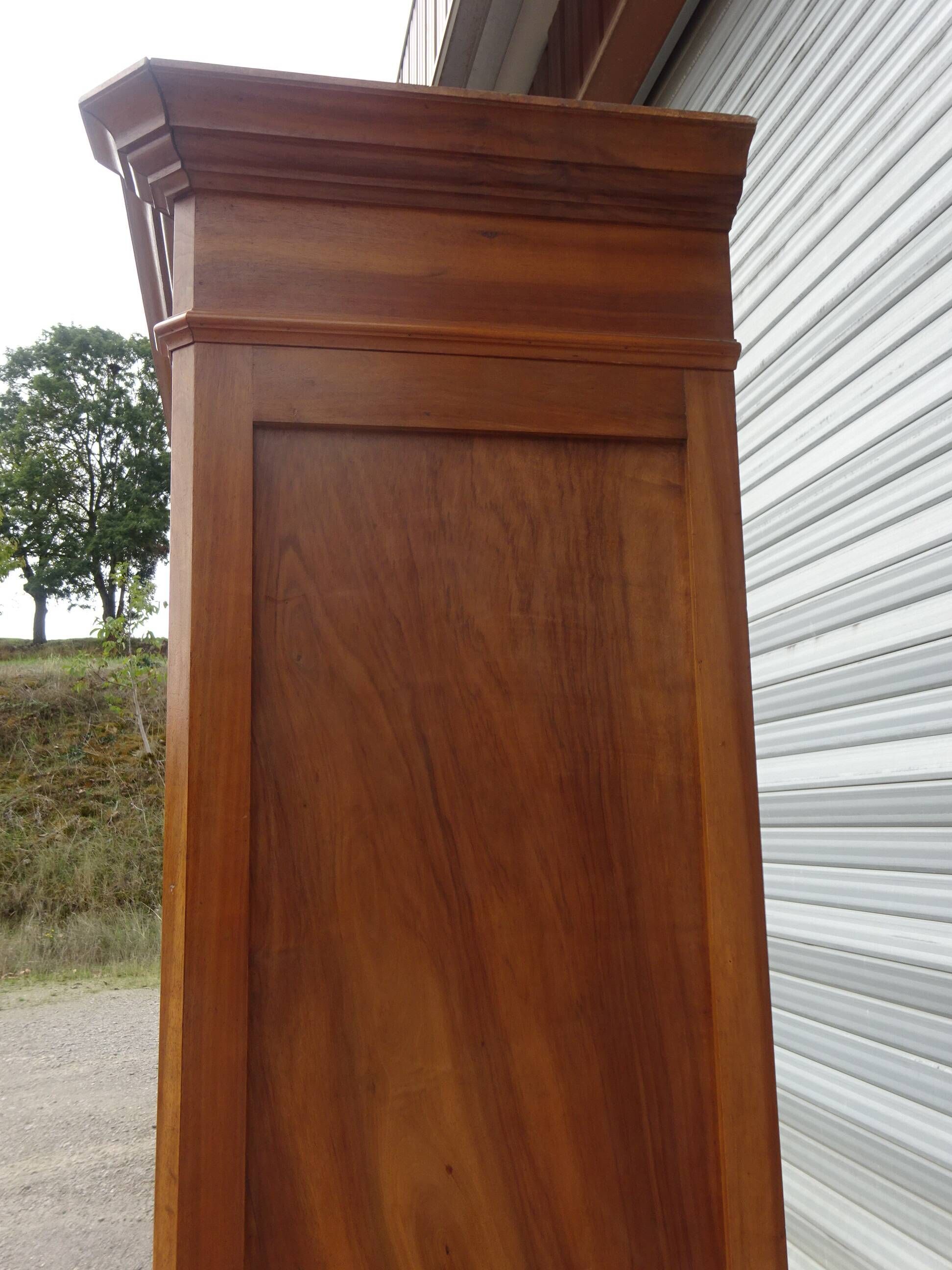 Large antique wardrobe in solid walnut