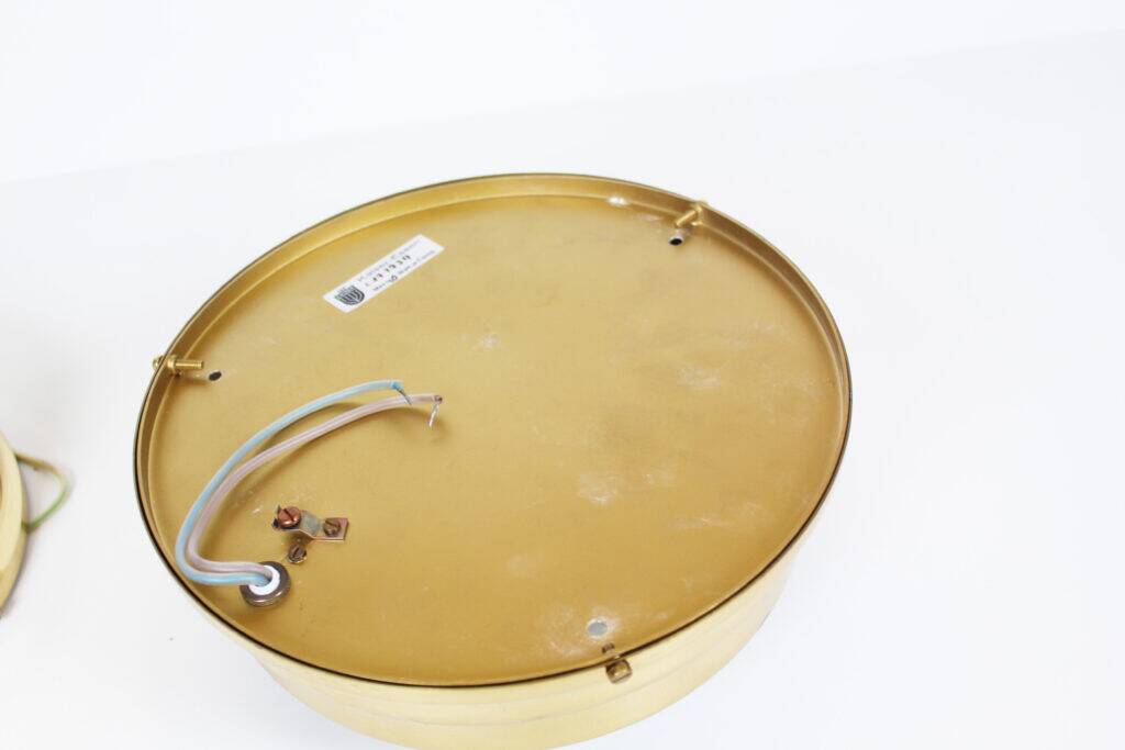 Pair of vintage brass ceiling lights with glass globe