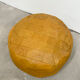 Ochre leather patchwork pouf