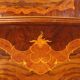 Antique baroque double bed in walnut and mahogany, 20th century.