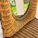 Oval wicker mirror