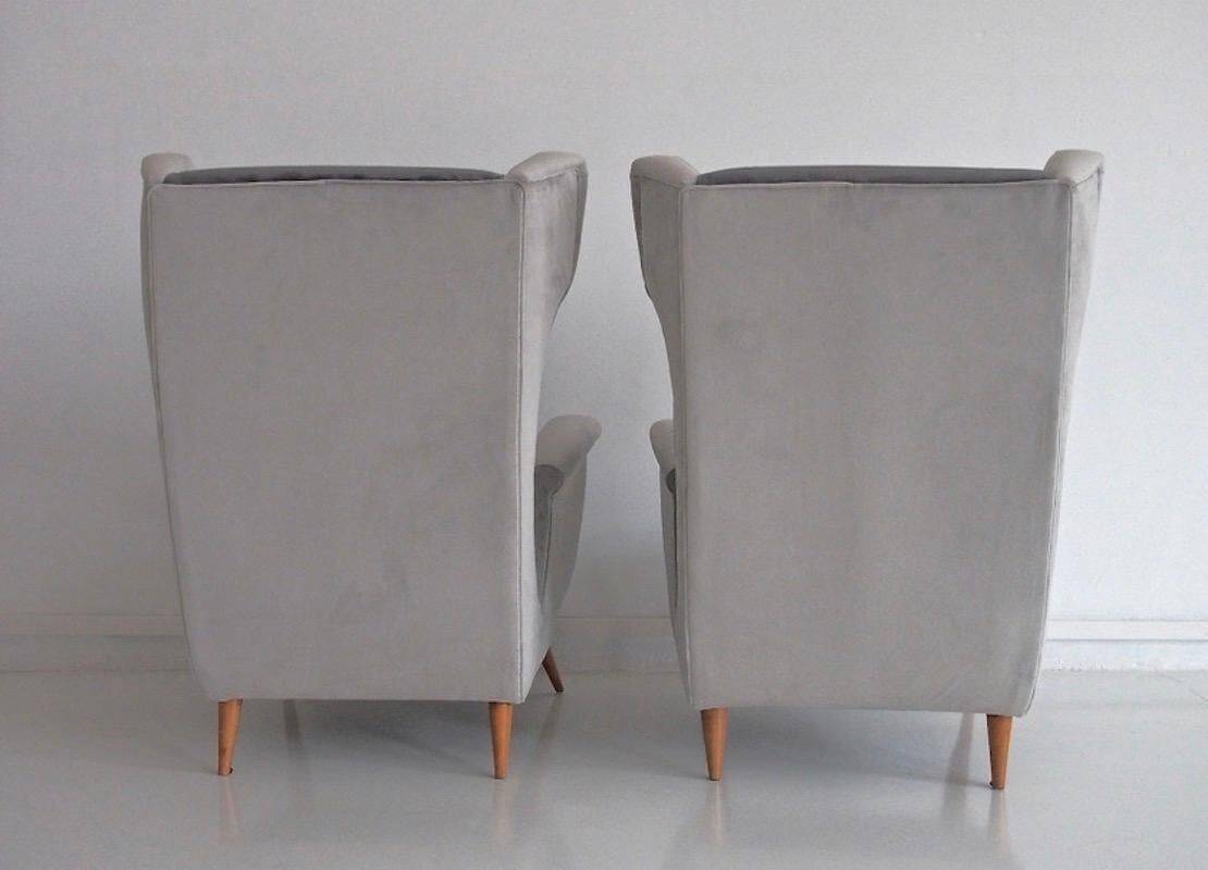 Pair of grey velvet armchairs in the style of Gio Ponti.