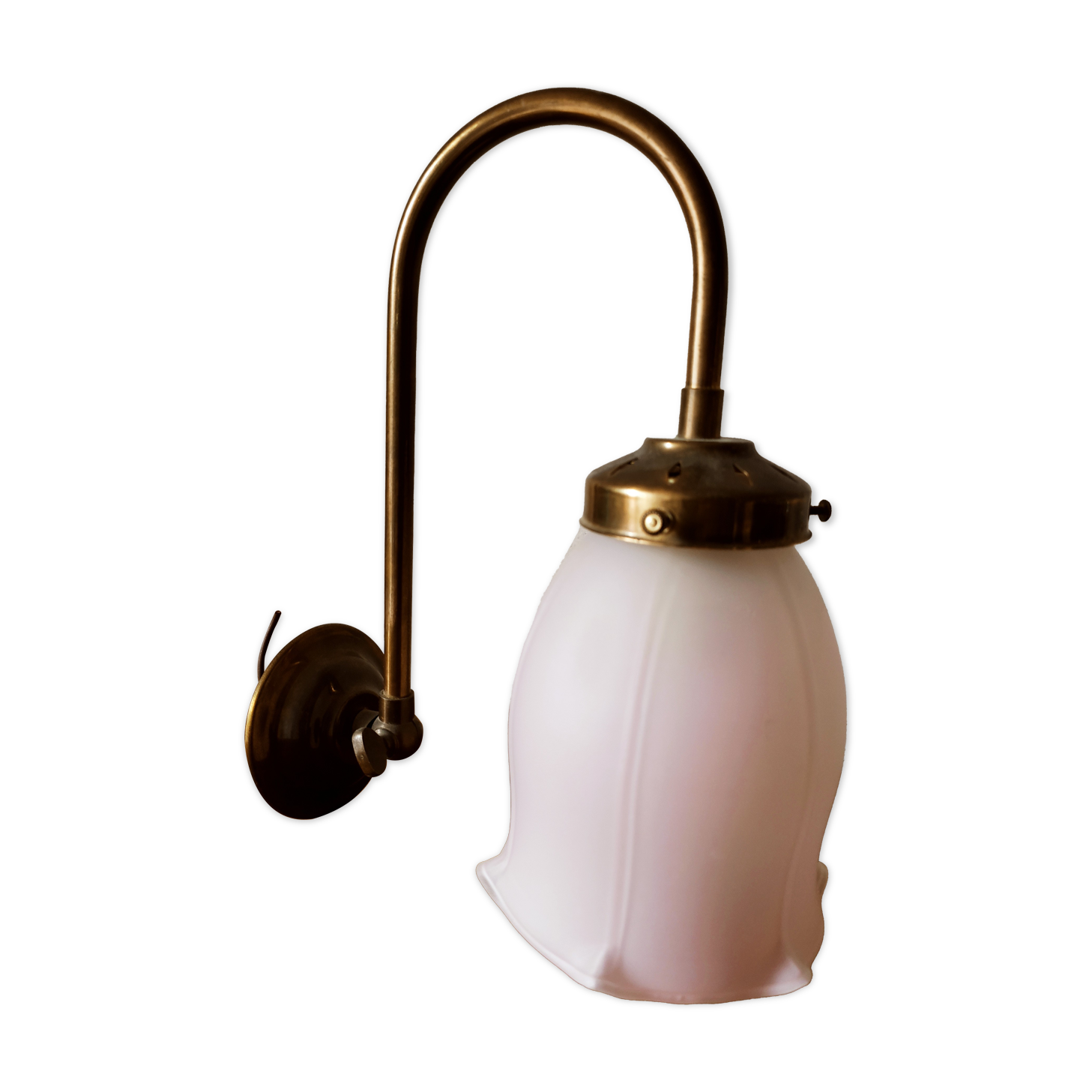 Brass wall lamp with pale pink bell