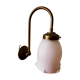 Brass wall lamp with pale pink bell