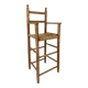 Old wooden high chair for children with a straw seat.