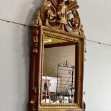Miroir en bois doré, style Louis XVI – 1ère partie XXe - 60x30cm