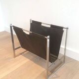 Magazine rack in brushed steel and leather, in the style of Poul Kjaerholm